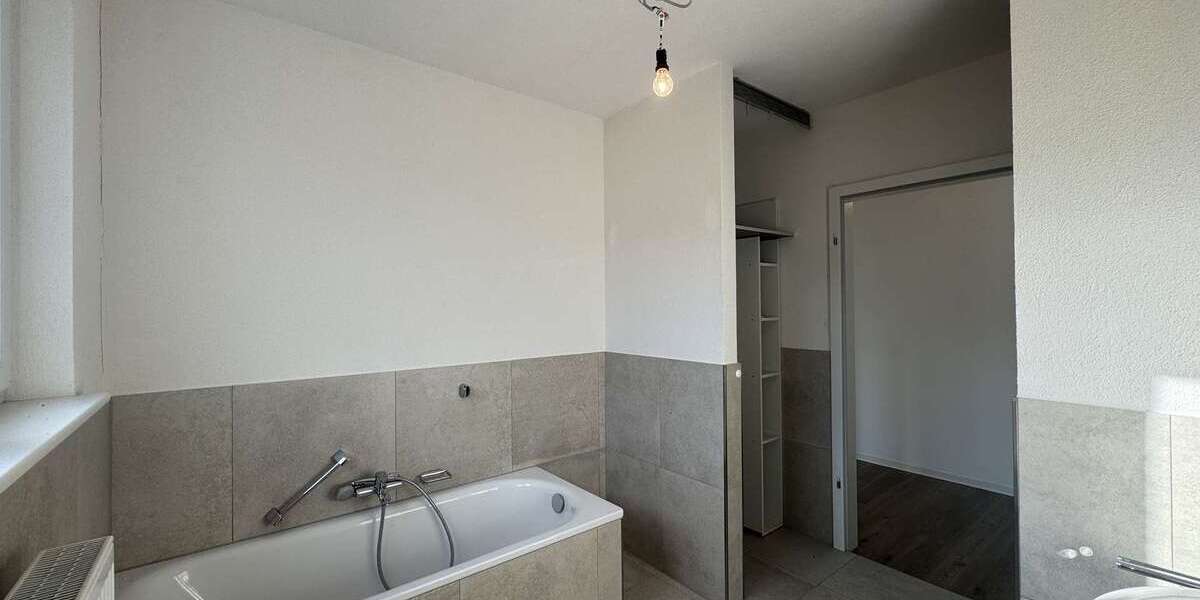 Investieren im Silberstreifen: Wohn-Gewerbeimmobilie mit Garten, Garage & Flexibilitä - Gewerbeobjekt Rheinstetten | Angebot:20367430