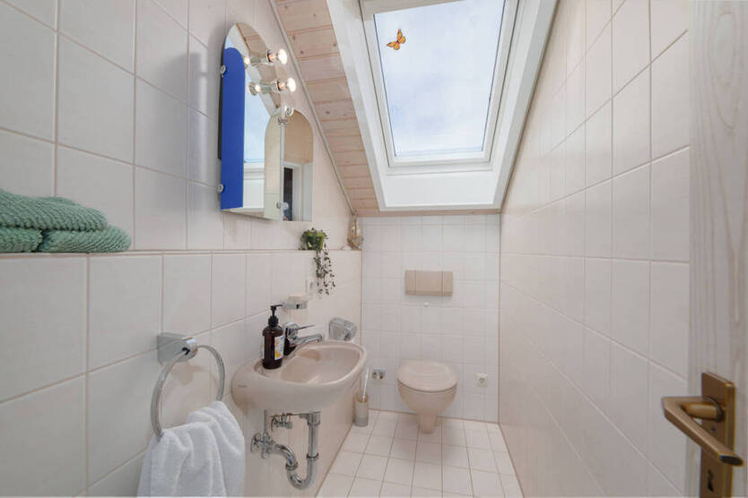 Seltene Gelegenheit! Stilvolle 3,5-Zimmer-DG-Wohnung mit Kamin und Garage und toller Aussicht!