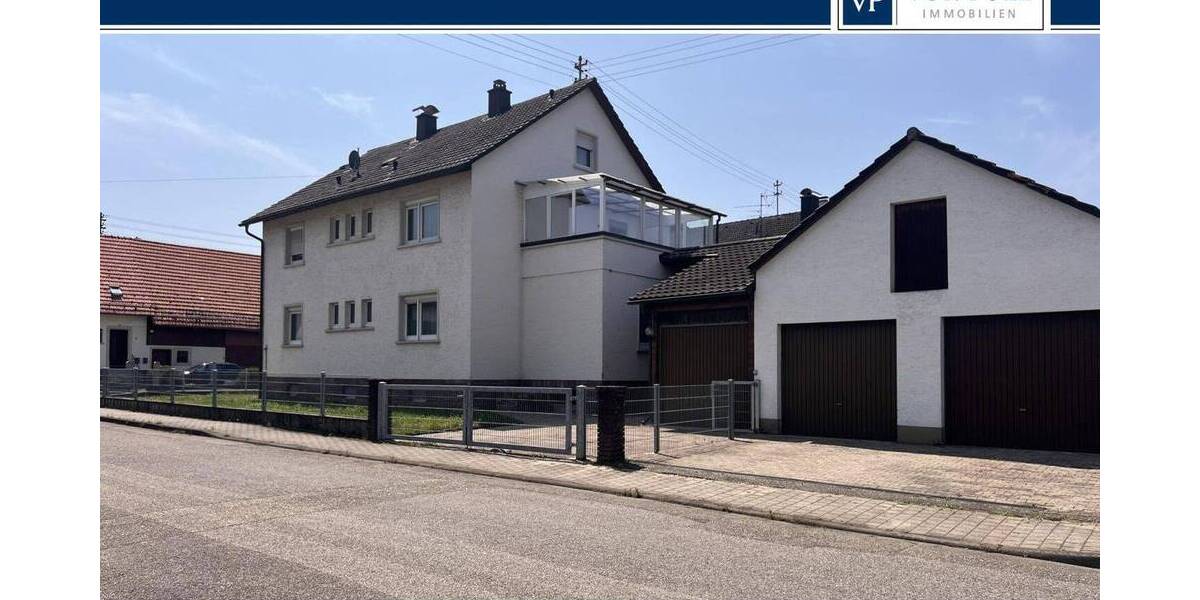 Zweifamilienhaus mit großem Grundstück und Nebengebäude 6 zimmer