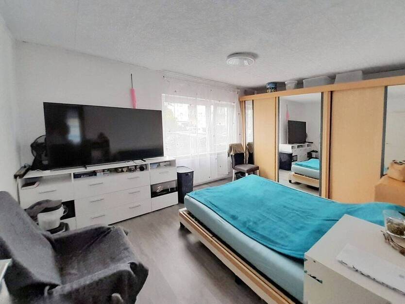 Vielseitiges, modernisiertes Zweifamilienhaus mit großem Potenzial in zentraler Lage