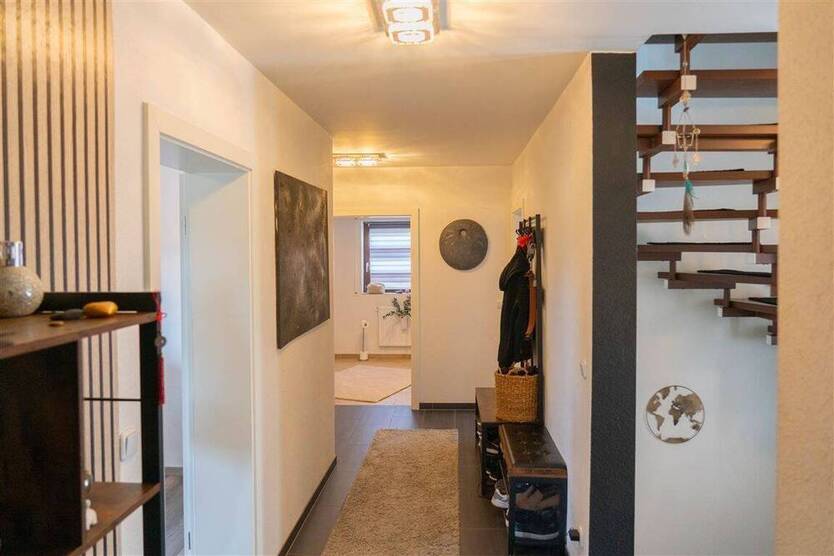 Vielseitiges Einfamilienhaus in idyllischer Lage - perfekt für Familien oder mehrere Generationen