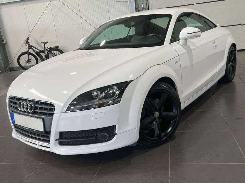 TT